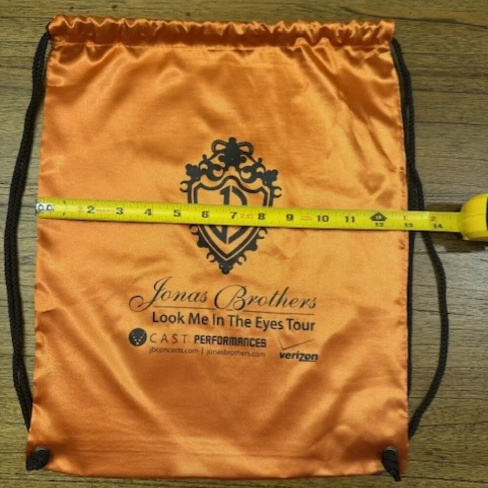 JONAS BROTHERS Orange Drawstring Bag